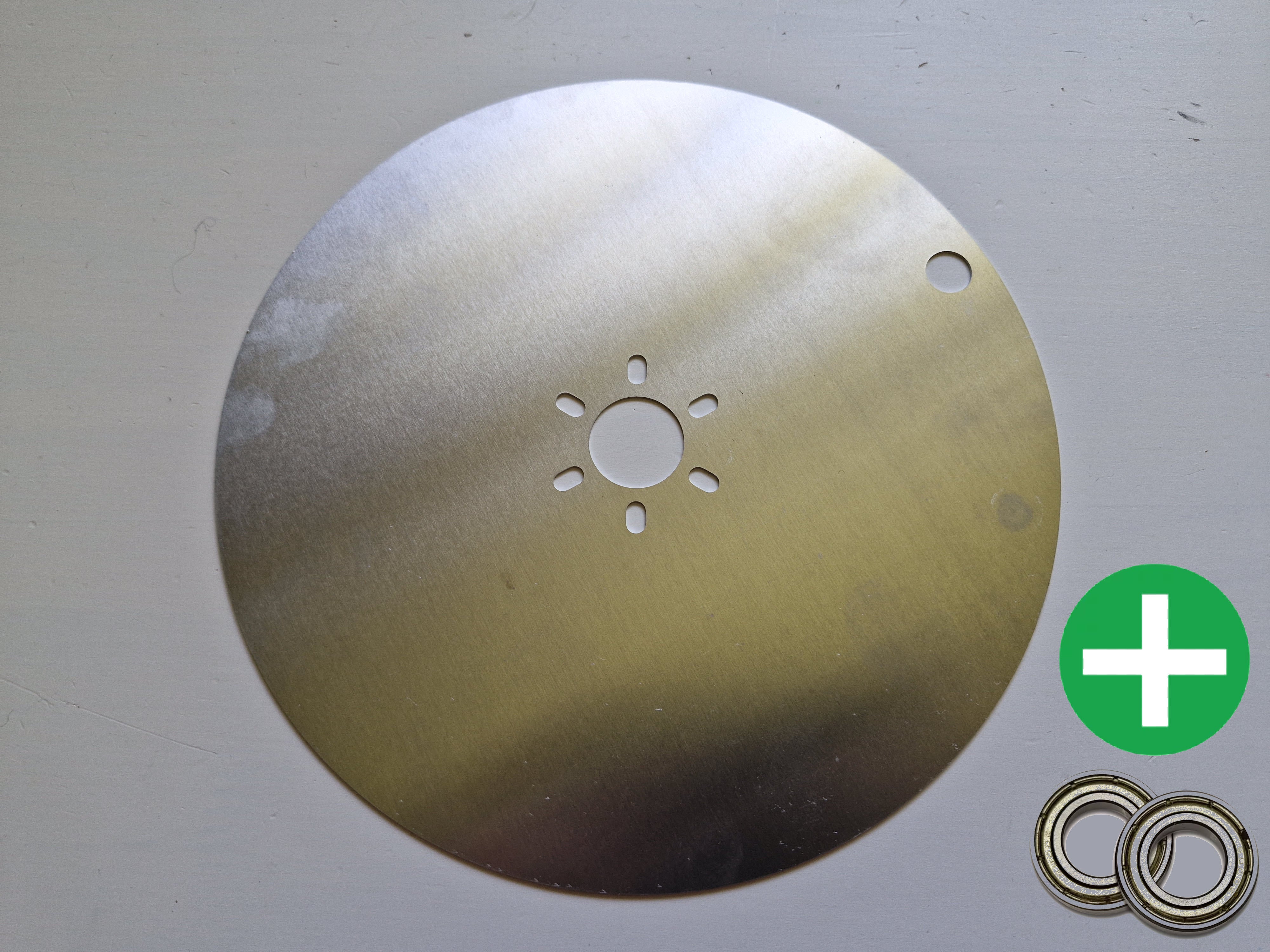 Skid plate including bearings for Husqvarna Automower and Gardena